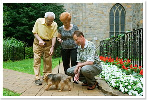 In the Methodist Home garden with the therapy dog