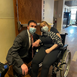 Photo of Councilman Eric Dinowitz posing with a Methodist Home resident, both of whom are wearing masks.