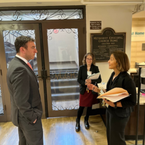 Photo of Councilman Eric Dinowitz talking to CEO and Administrator of the Methodist Home, Maria Perez